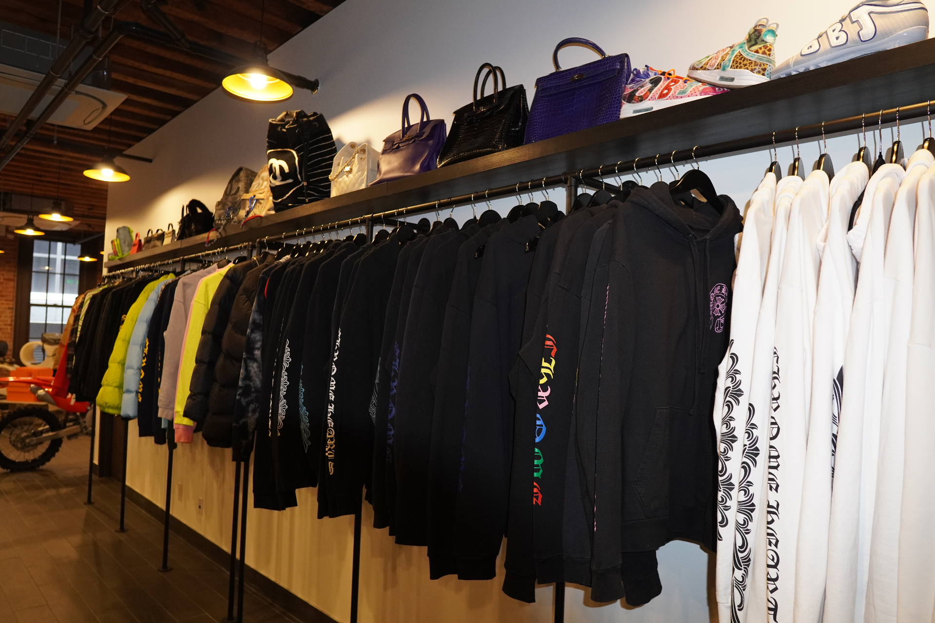 Hoodies, outerwear, and rare bags lining the Once Legos NYC showroom