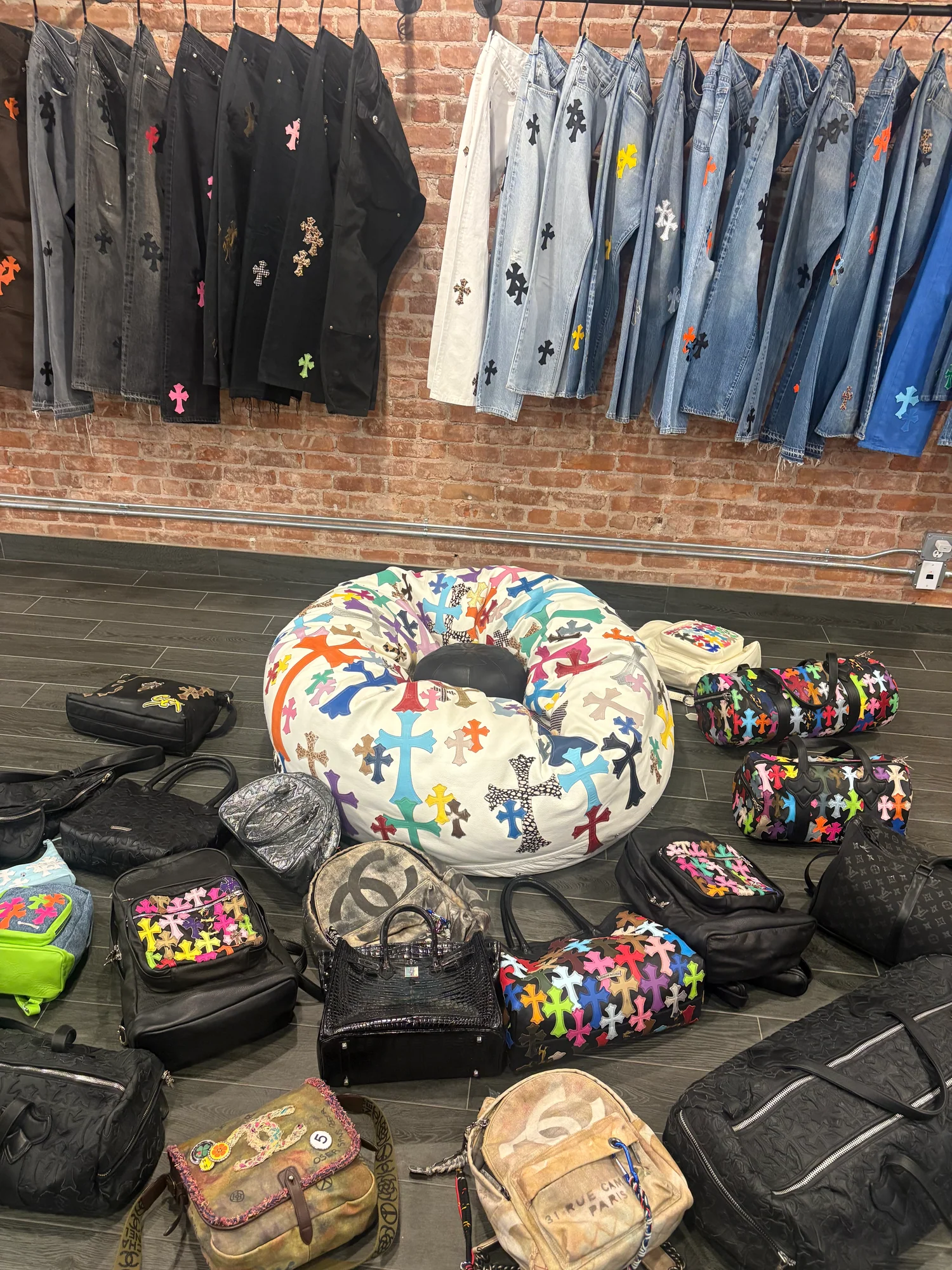 Once Legos showroom — Chrome Hearts denim and bags